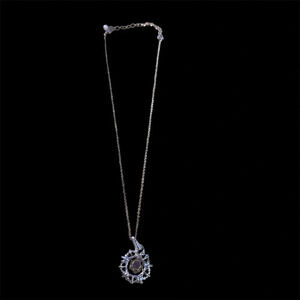 Avon silvertone round pendant  necklace 20” length small gem inside circle